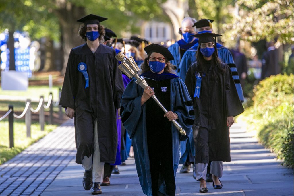 The university mace leads the procession of faculty